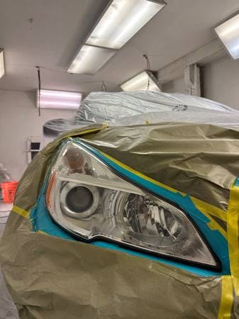 Prepping the front of a car for a paint job